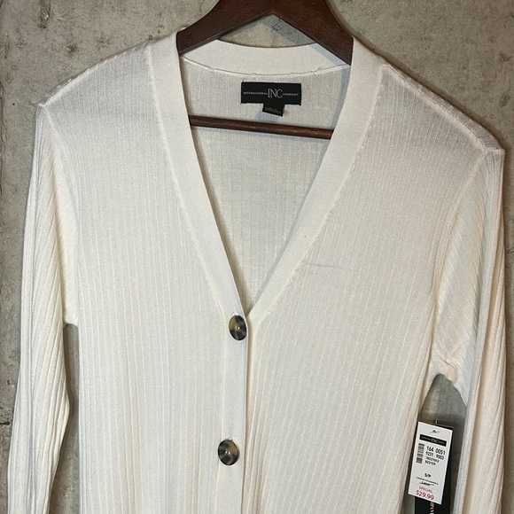 NEW International INC Company sweater - Picture 1 of 6